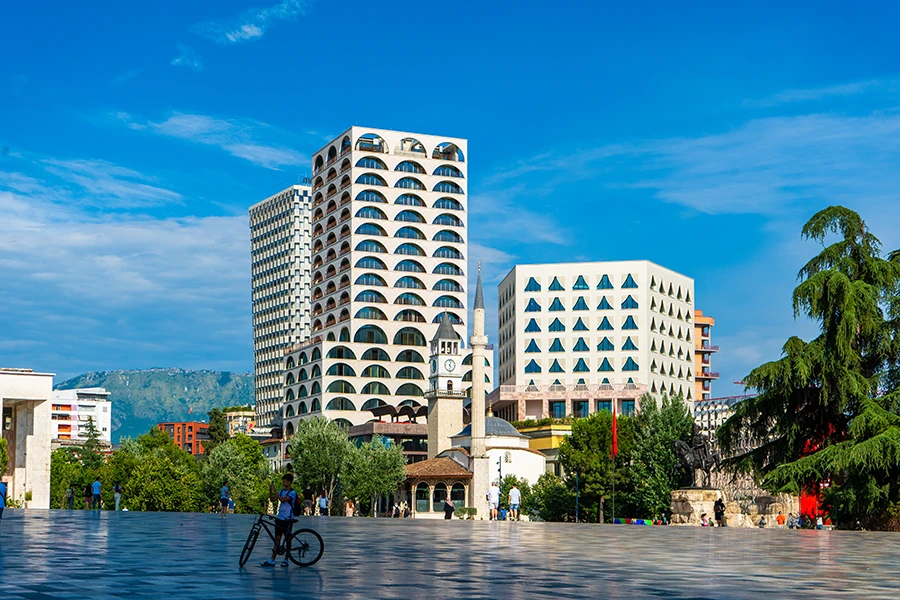 Walking across Skanderbeg Square in Tirana