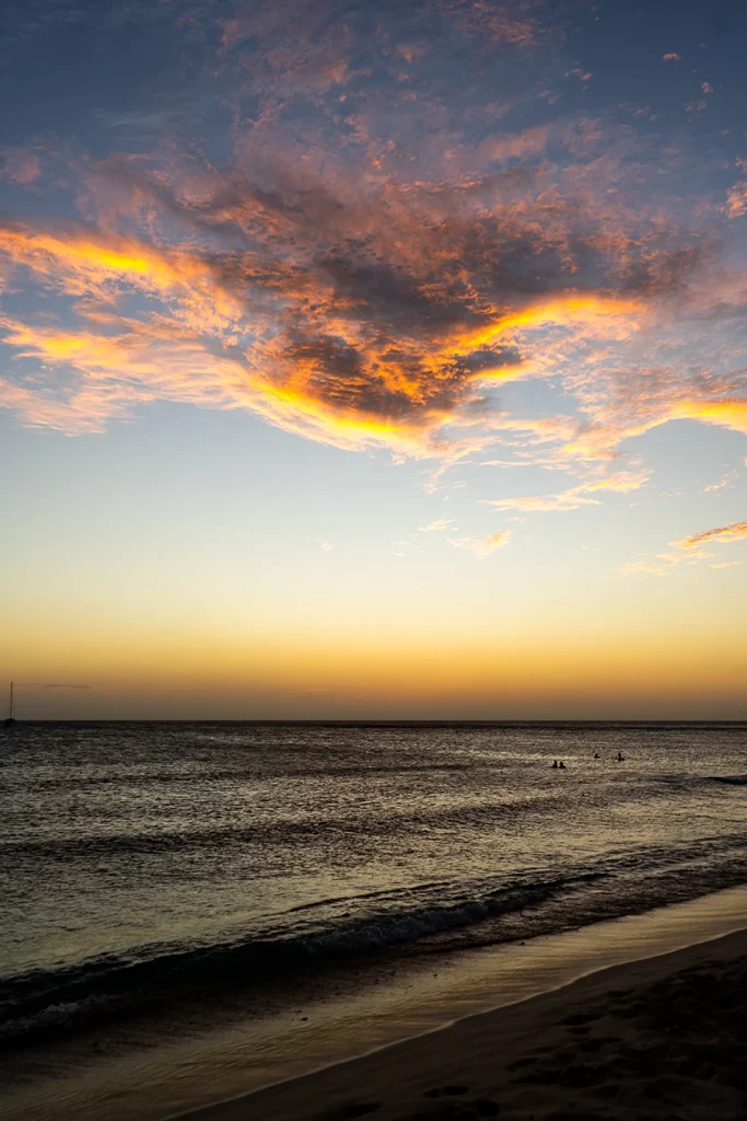 The colorful sky above Arashi Beach after sunset