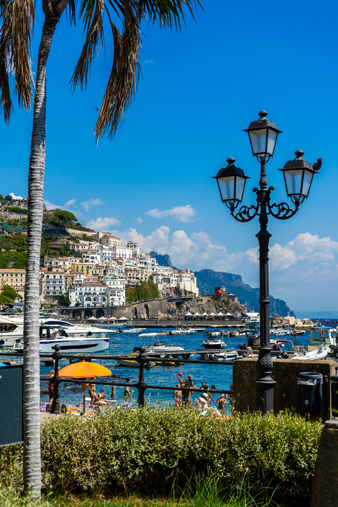 The coastal town of Amalfi on the Amalfi Coast; strolling along the harbor and on the promenade